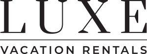 Luxe Vacation Rentals logo - Savannah and St. Simons Island